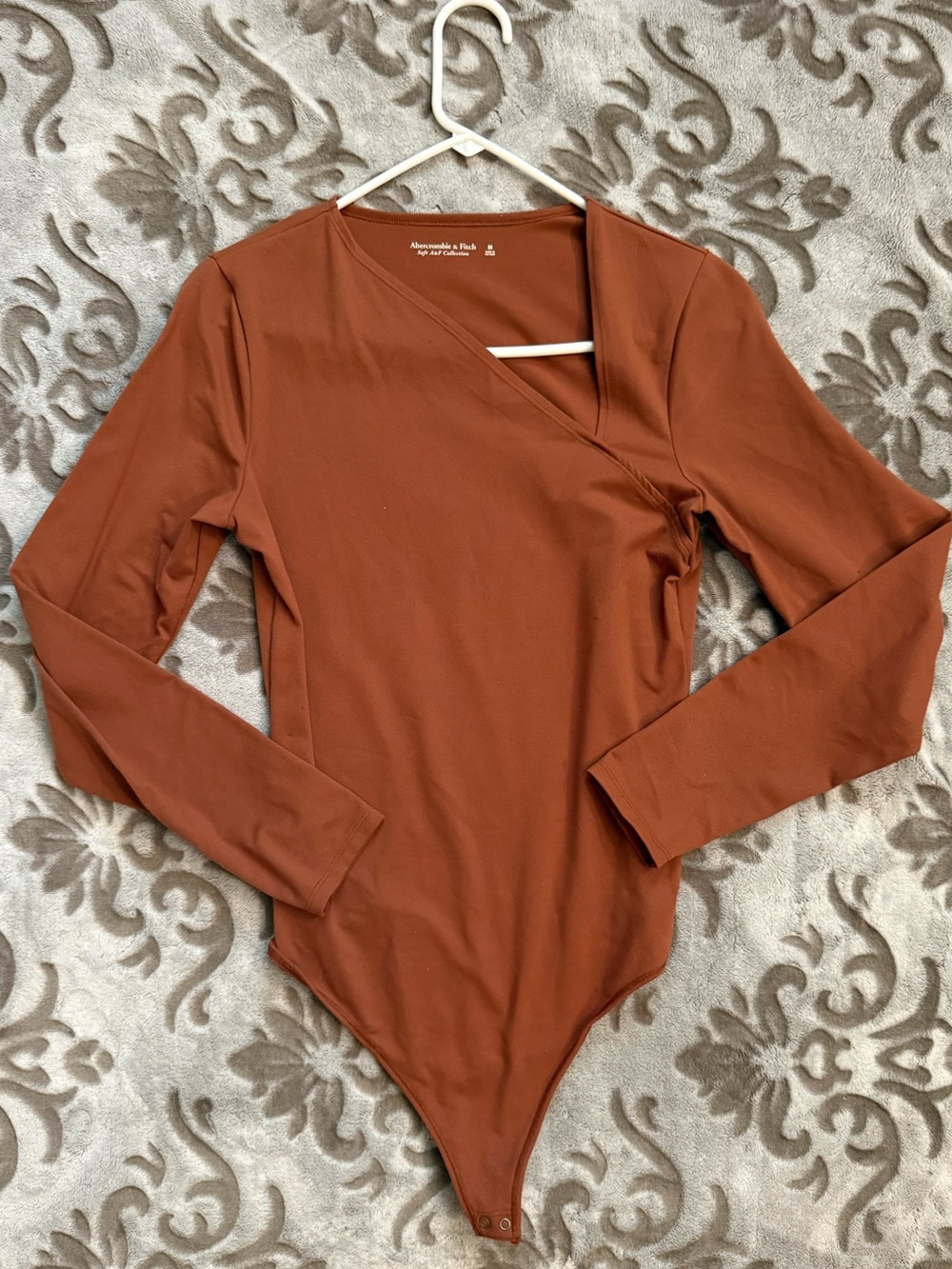 Abercrombie & Fitch Long-Sleeve Bodysuit in Rust Brown